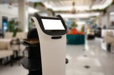 Artificial intelligence assistant personal robot for serve foods in restaurant. Robotic trend technology business concept